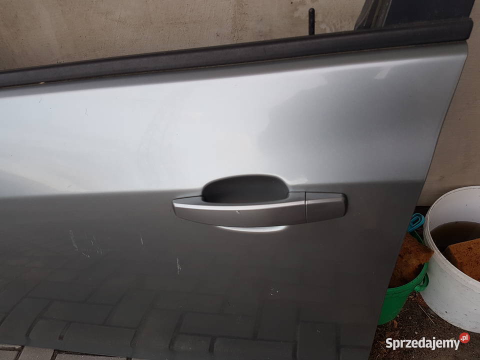 OPEL ASTRA J 4 2011 2012 2013 DRZWI LEWE PRZOD części blacharskie Karoseria Turek sprzedam