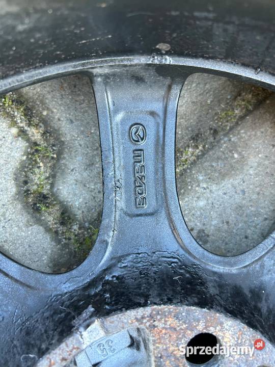Oryginalne felgi aluminiowe 15 do mazda 2 i