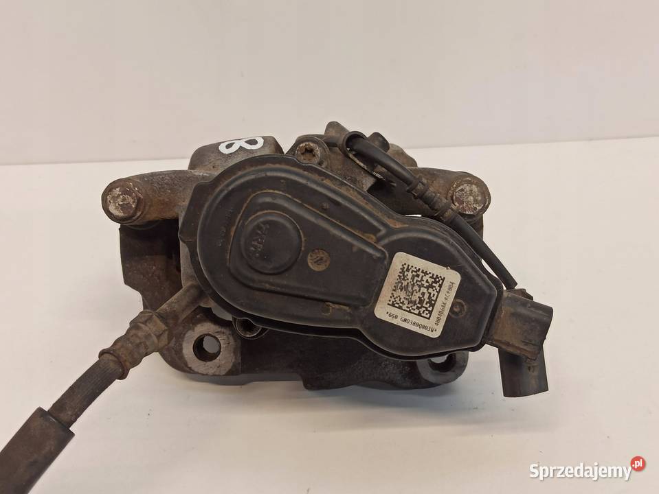 AUDI A8 D4 ZACISK HAMULCOWY PRAWY TYŁ 4H0615404