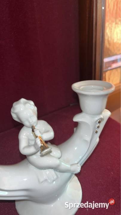 Świecznik z Putto grający na złotym flecie Syg Gdańsk