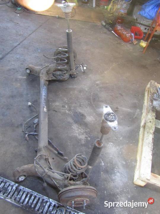 BELKA OŚ ZAWIESZENIA TYŁ TYLNA 15 B MAZDA 2 DJ