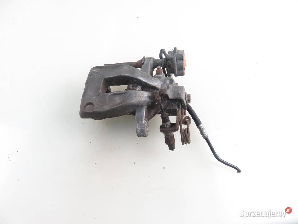 ZACISK LEWY TYŁ PEUGEOT 207 16 HDi osobowe Części samochodowe