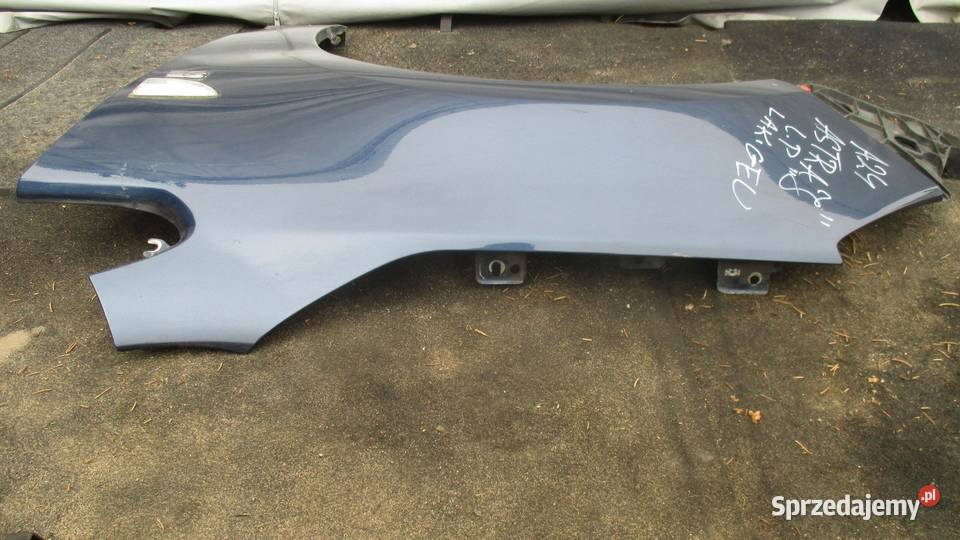 OPEL ASTRA J IV 10r błotnik lewy przód