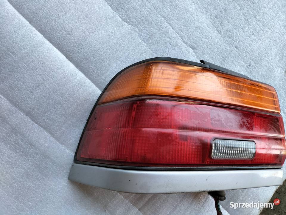 LAMPA TYŁ TYLNA TOYOTA COROLLA E10 LEWA osobowe Kamień-Kolonia