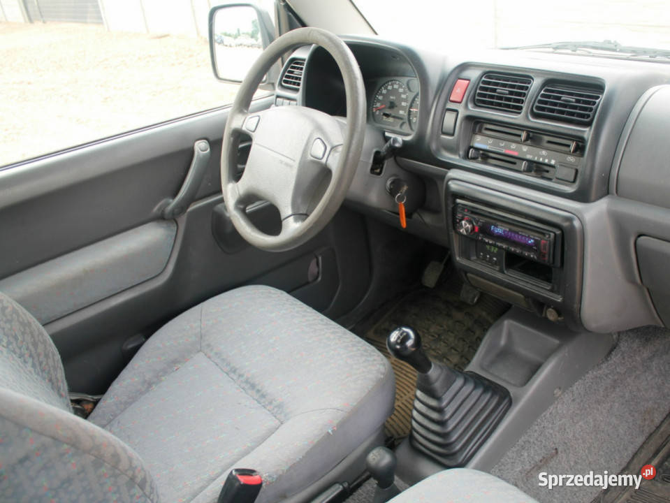 Suzuki Jimny 13 Benzyna 80 4X4 Cabrio NAPĘDY srebrny Zielenin