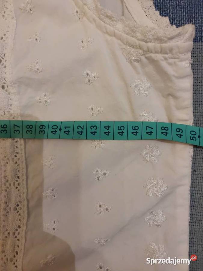 Biała bawełniana bluzka bez rękawów z haftem Wrocław