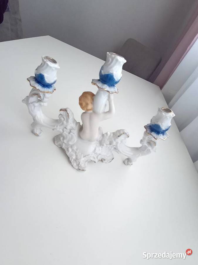 Porcelanowy świecznik z figurą Suwałki sprzedam