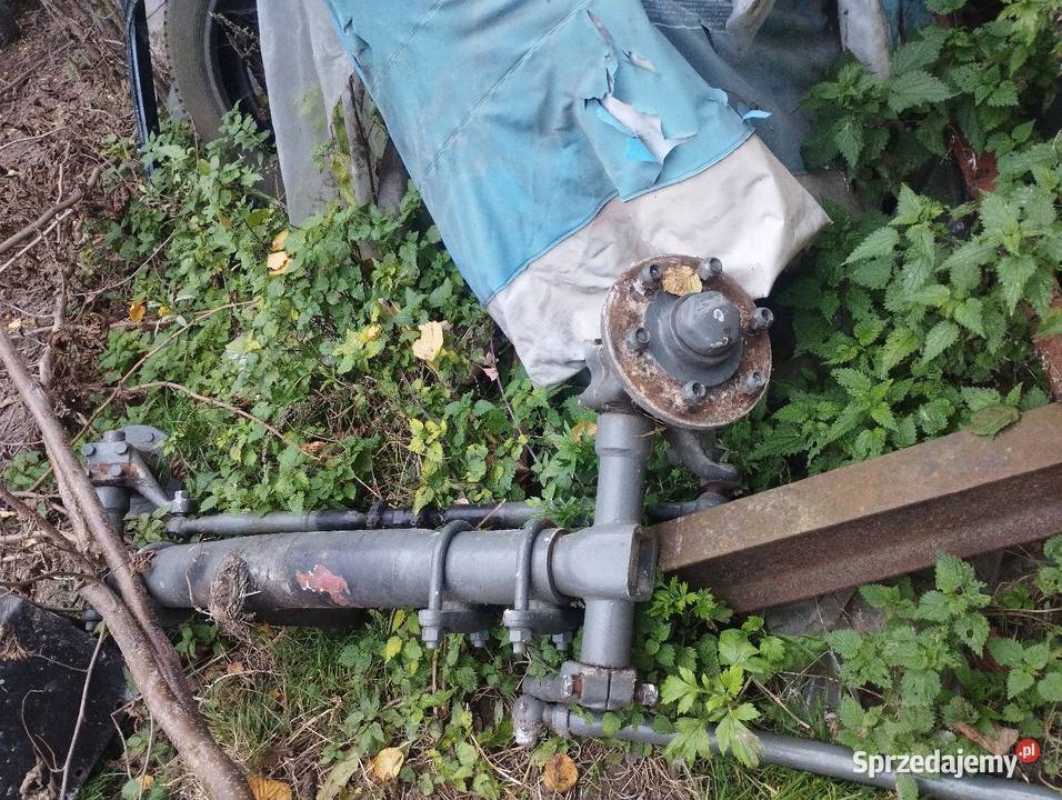 Oś okrągła Ursus z kołami