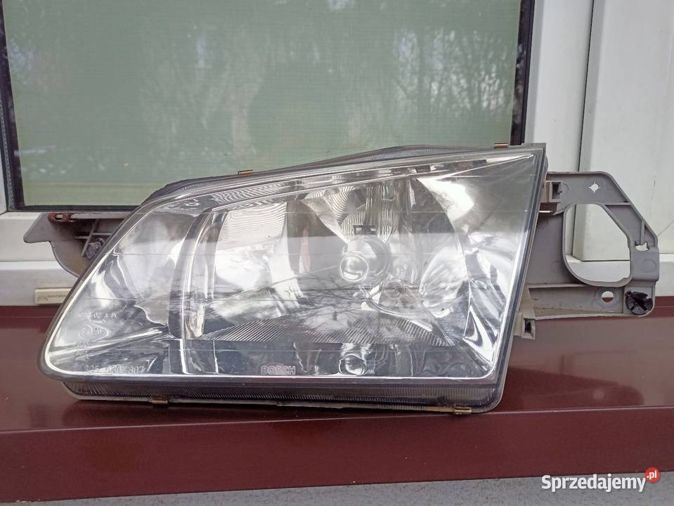 Mazda 323F BJ lampa przednia lewa reflektor Sieradz sprzedam