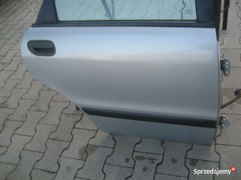 volvo s40 9600r drzwi tył prawe srebne kod Rakoniewice sprzedam