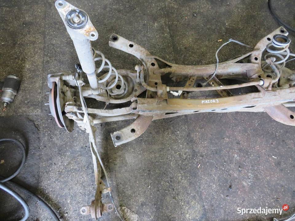 BELKA ZAWIESZENIA OŚ TYŁ MAZDA 3 BM 13