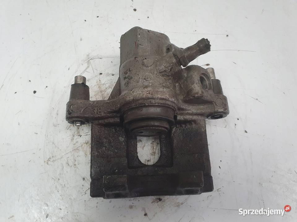 Mazda 3 II TYLNY ZACISK HAMULCOWY lewy tył Rudka