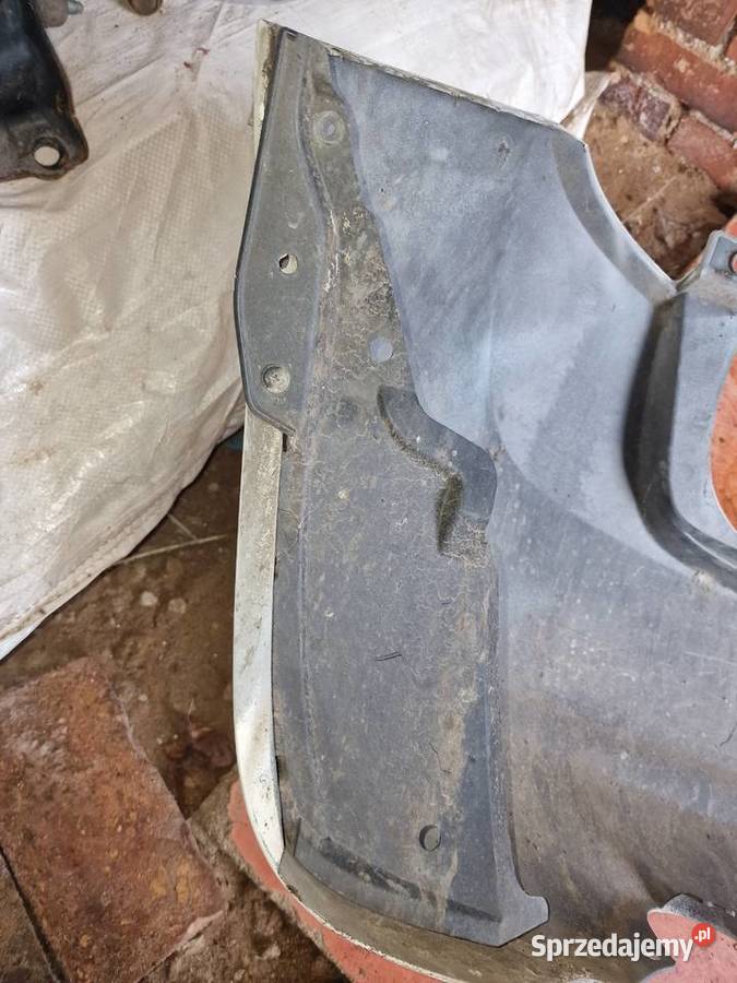 Note e12 nadkola przednie lewe Jasień