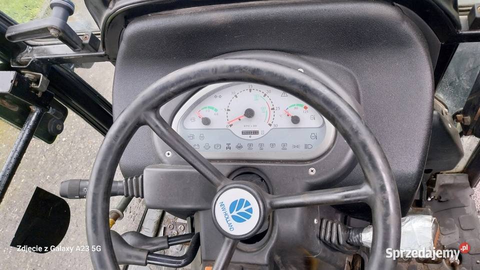 Ciągnik Holland TCE 45 z kabiną TUZ podnośnik