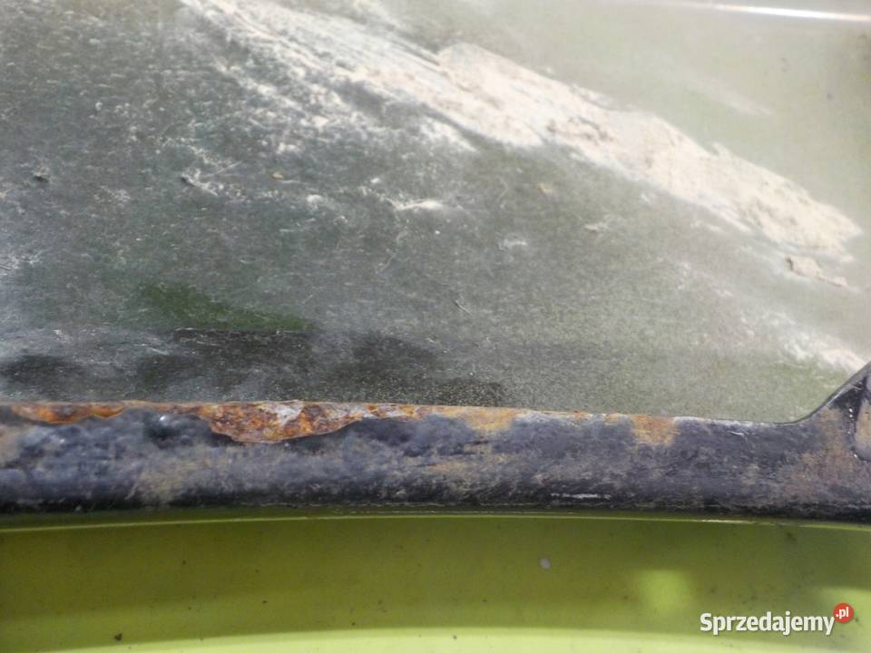 NISSAN NAVARA III D40 25 D 06r 5D blotnik lewy Błotniki Suków sprzedam