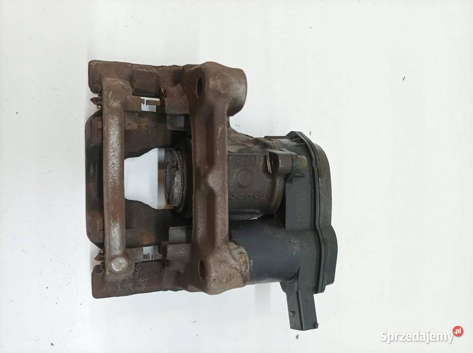 ZACISK HAMULCOWY LEWY TYŁ ELEKTRYCZNY 58210N7600 Rok produkcji 2021