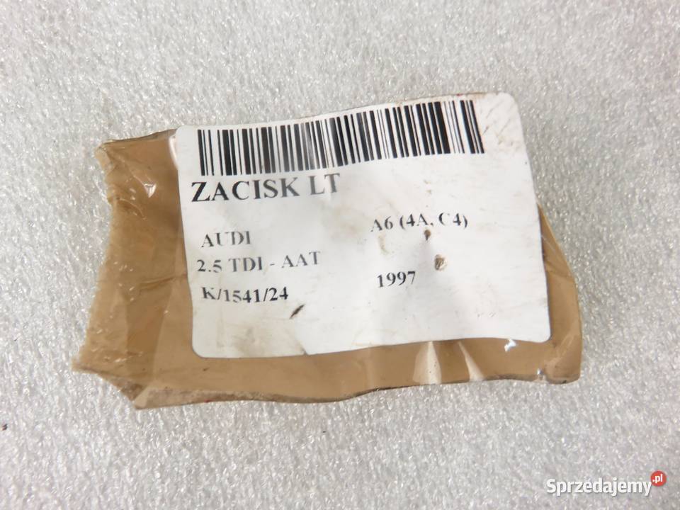 ZACISK LEWY TYŁ AUDI A6 C4 25 TDI