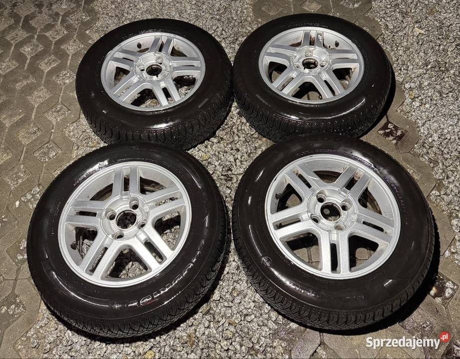 Alufelgi Ford 4x108 opony wielosezon 1956515 Krępiec