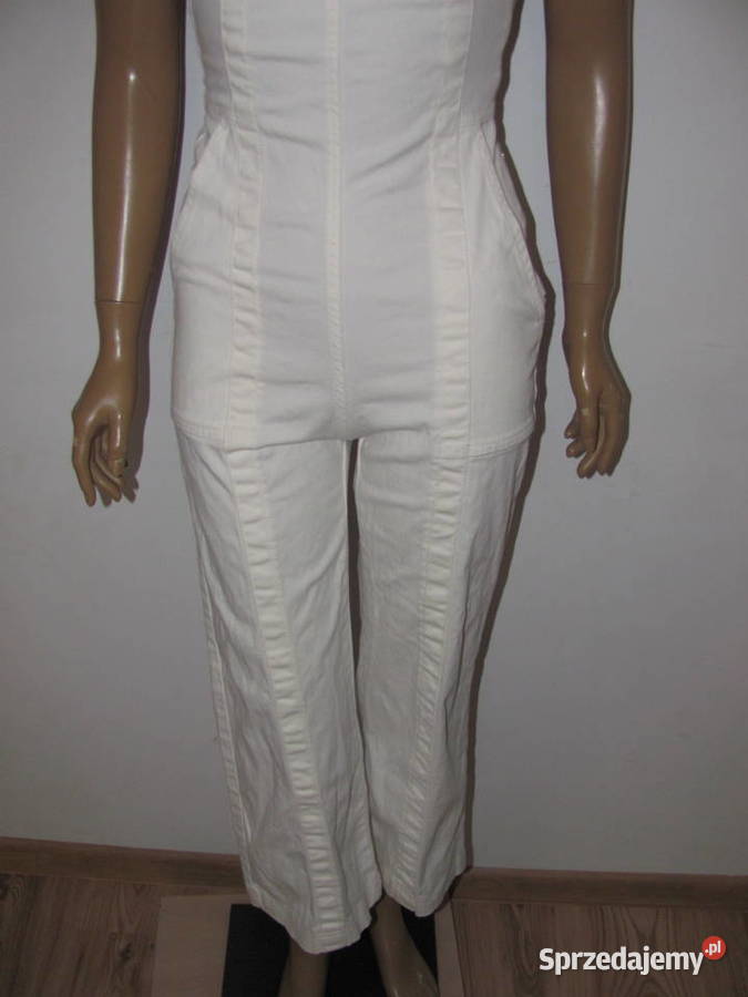 Kombinezon bez rękawów dzwony kremowe spodnie Zamość