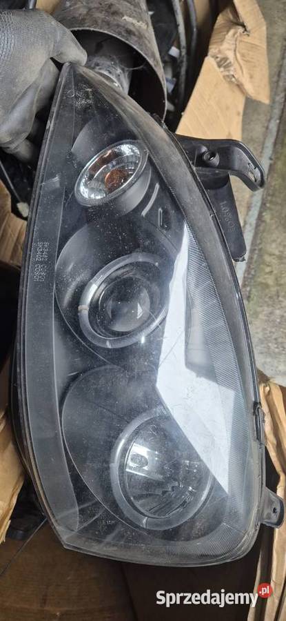 OPEL CORSA C 0106COMBO REFLEKTOR LAMPA LEWA Bełchatów