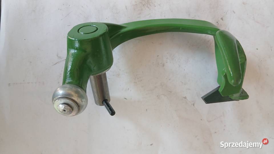 Przytrzymywacz sznurka John Deere ramie z nożem Radomsko