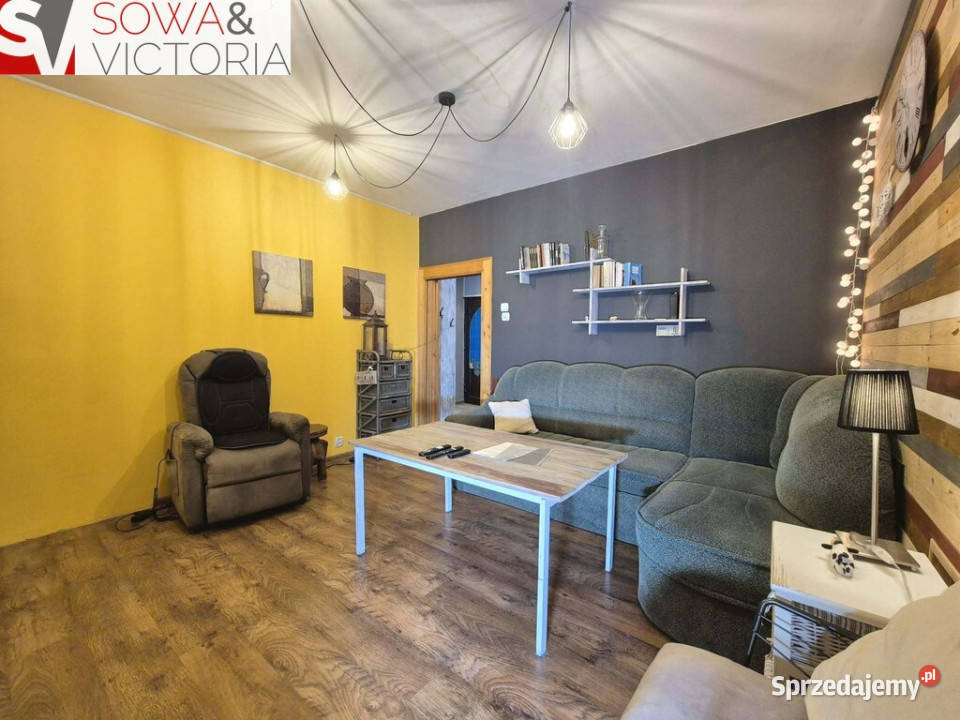 Mieszkanie z garderobą ogródkiem i garażem cegła