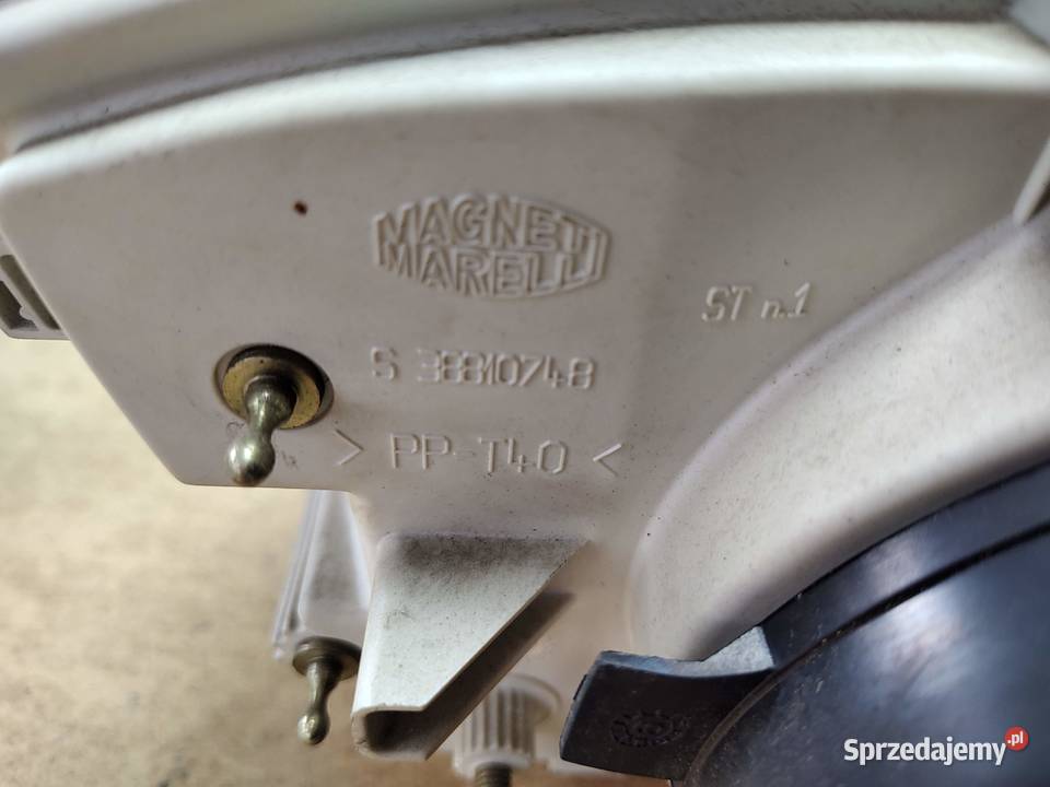 Reflektor lewy Seicento oryginał Carello osobowe Lampy przednie Oświetlenie Oborniki