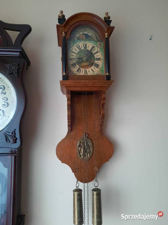 Stary zegar Wuba z fazami księżyca Słomniki