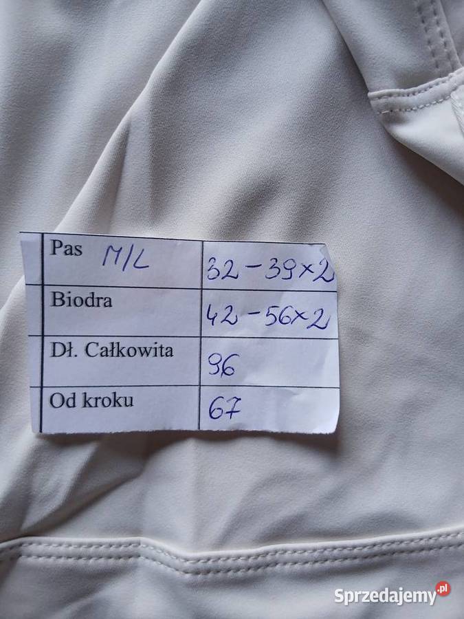 Sportowe leginsy bezowe Lxl