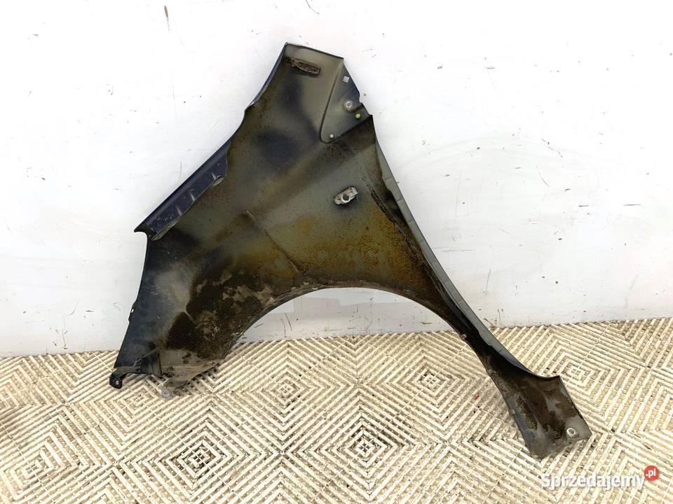 BŁOTNIK PRAWY PRZÓD NISSAN NOTE E11 Minivan 0513