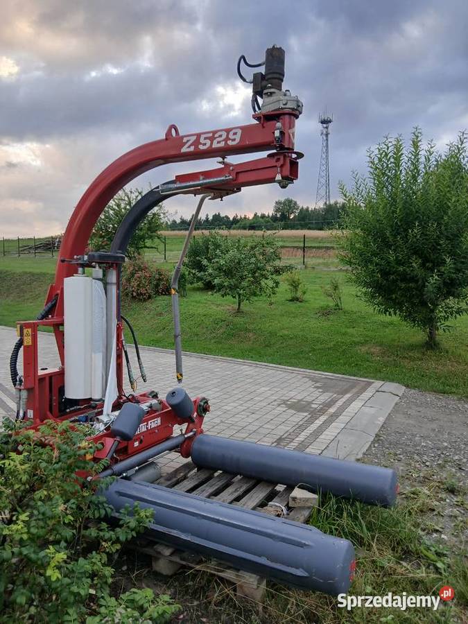 Owijarka do bel samozaładowcza ze stawiaczem