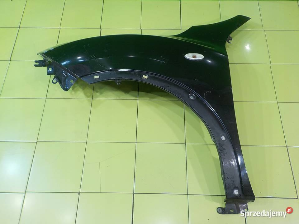 NISSAN JUKE I F15 16 B 12r 5D blotnik lewy przod Suków