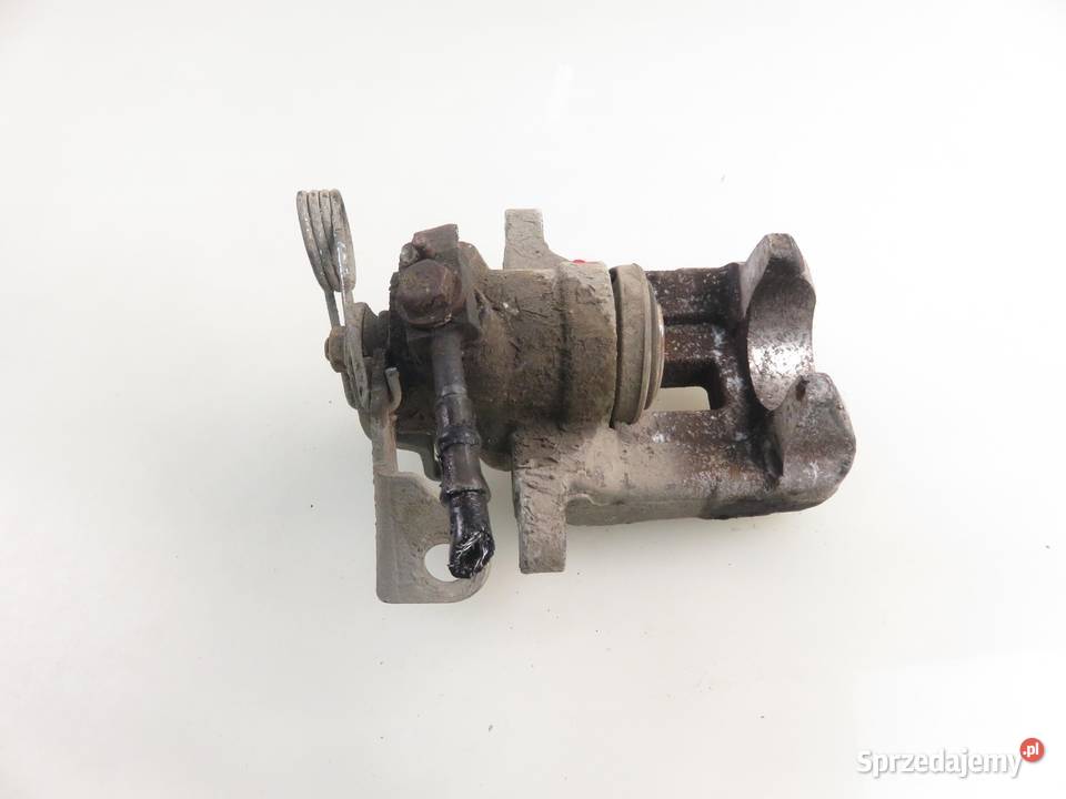 ZACISK PRAWY TYŁ VW PASSAT B5 19 TDI