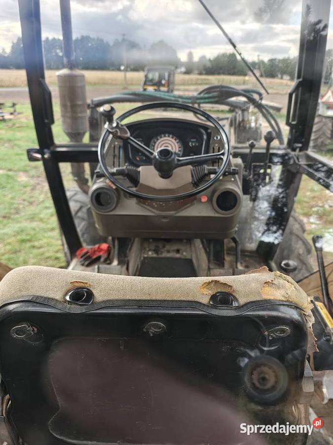 Leyland 704 z turem Traktor Case 1490 Kalisz