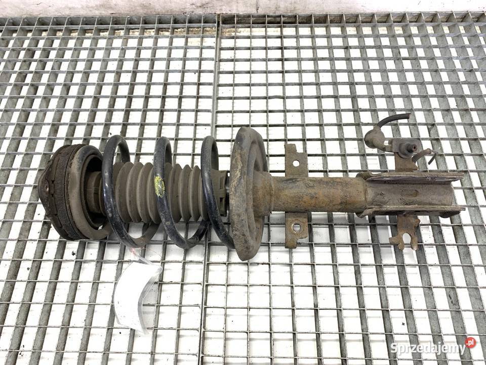 AMORTYZATOR PRAWY PRZÓD ZE SPRĘŻYNĄ RENAULT