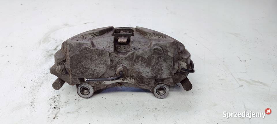 ZACISK HAMULCOWY PRAWY PRZÓD AUDI A4 A5 8W06CC osobowe Zaciski i jarzma Przystajń