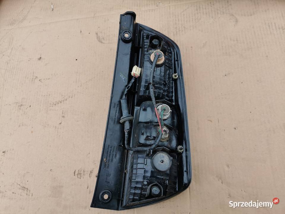 Lampa tył tylnia lewa Daihatsu Sirion 2 II 0510