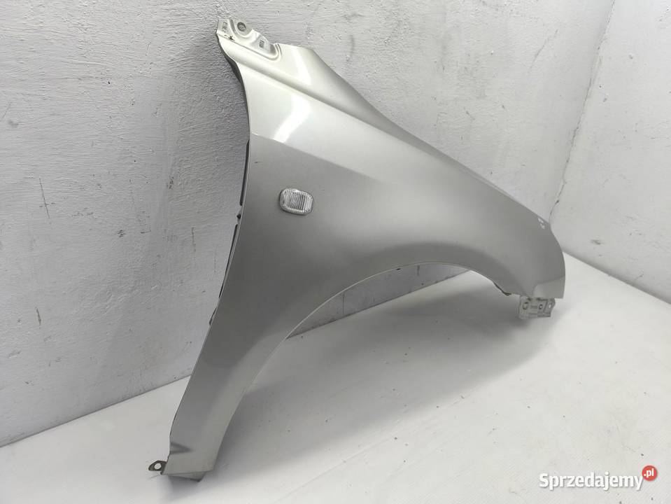 BŁOTNIK PRAWY PRZÓD TOYOTA AVENSIS II T25 osobowe Błotniki wielkopolskie