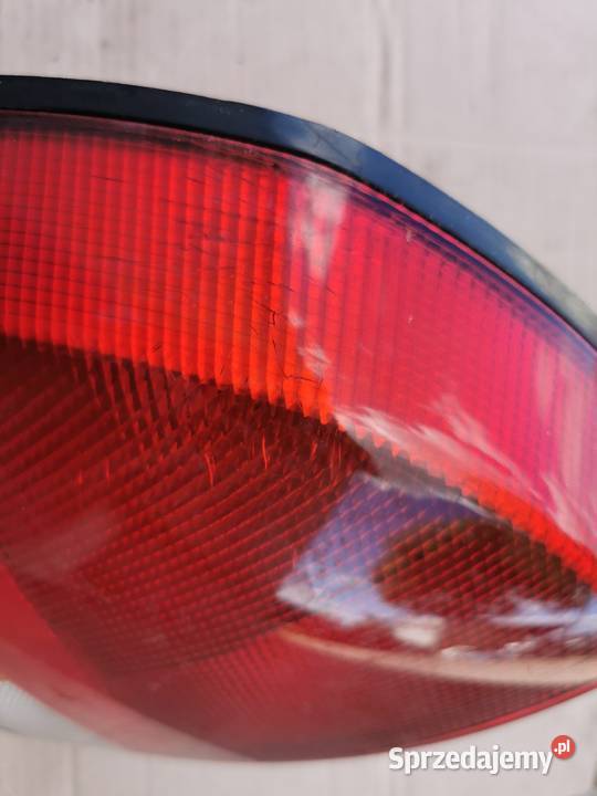 Lampa lewa tył tylnia mitsubishi Carisma hb 5d Oświetlenie Międzychód