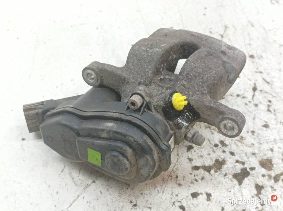 ZACISK HAMULCOWY PRAWY TYŁ ELEKTRYCZNY 16 DCI Zaciski i jarzma