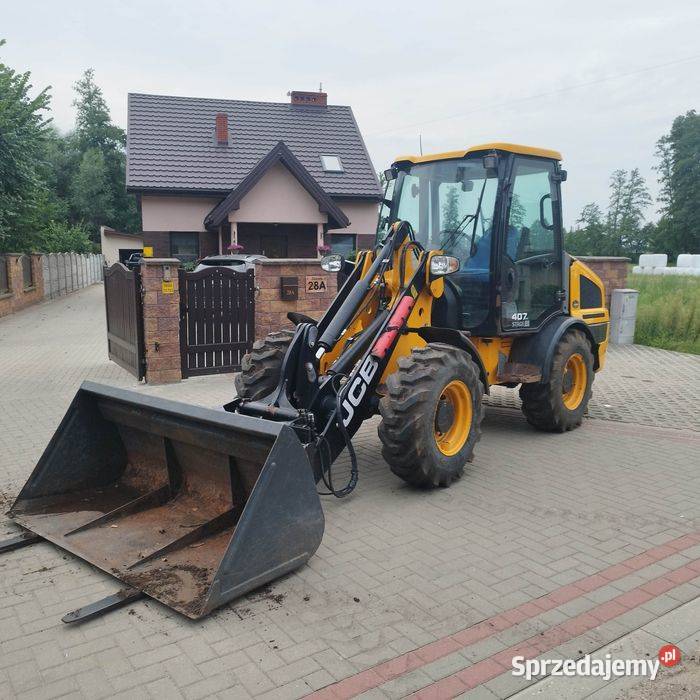 Ładowarka przegubowa JCB 407 kołowa 2021r Cat łódzkie Łowicz sprzedam