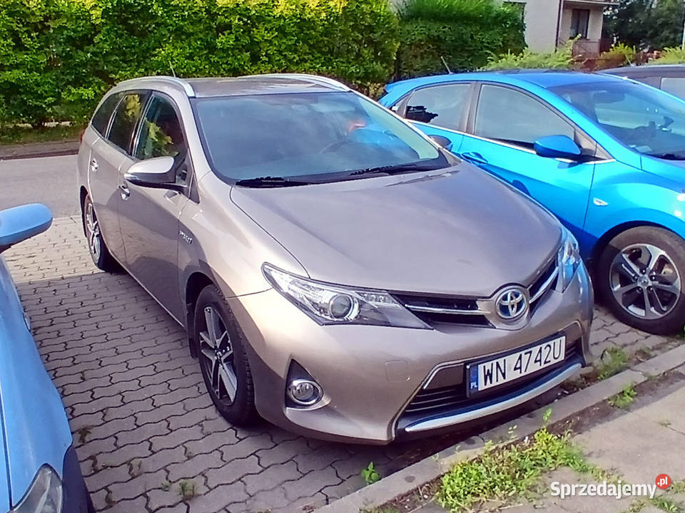 Toyota Auris HSD Hybrid Touring Sports Prestige kupiony w polskim salonie Warszawa
