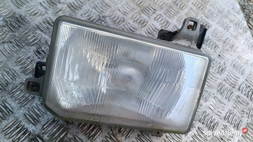 LAMPA LEWA PRZÓD NISSAN TERRANO I WD21 8694 Lampy przednie Radłów