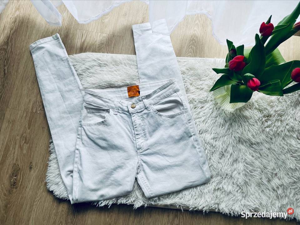 Białe spodnie jeansy 100cotton Rzeszów