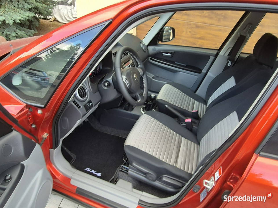Suzuki SX4 16B 120 4x4 2008 Wyjątkowo Zadbny Z pomarańczowy mazowieckie