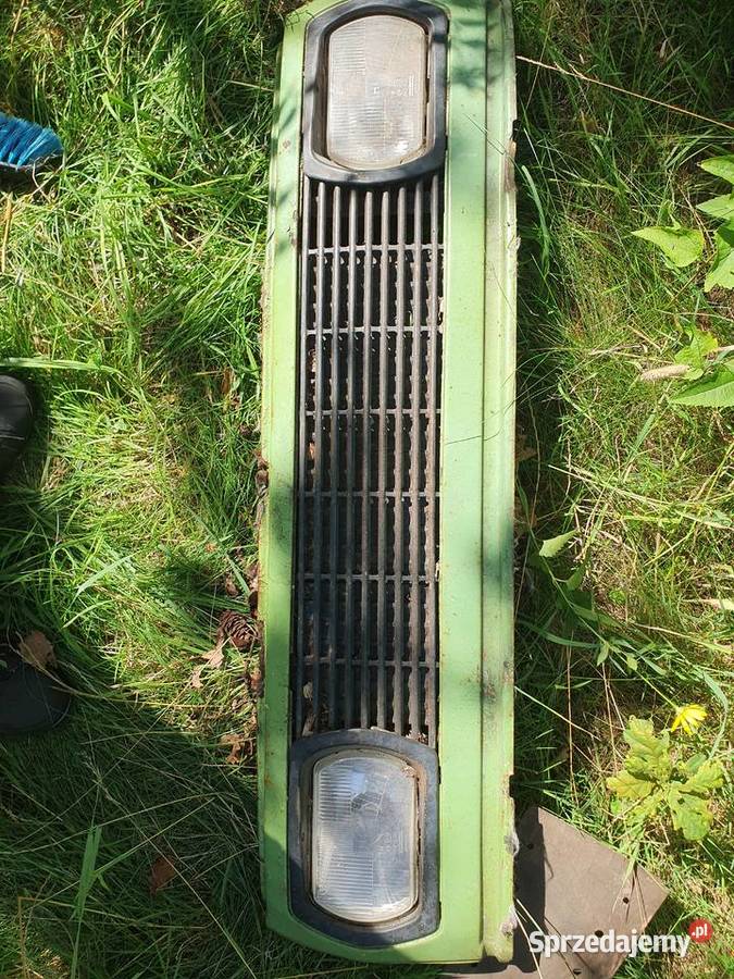 Front pas przedni zielony ze światłami grill