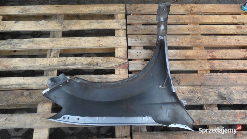 NISSAN QASHQAI I J10 LIFT 10r błotnik lewy przód