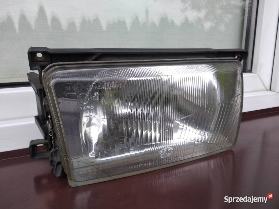 VW Polo II 86c2f lampa przednia prawa reflektor Sieradz