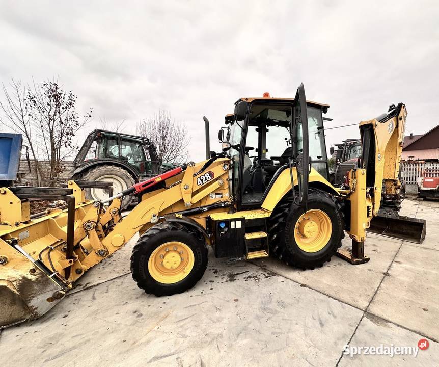 Koparko ładowarka CAT 428 Koparko ładowarki Tokarnia