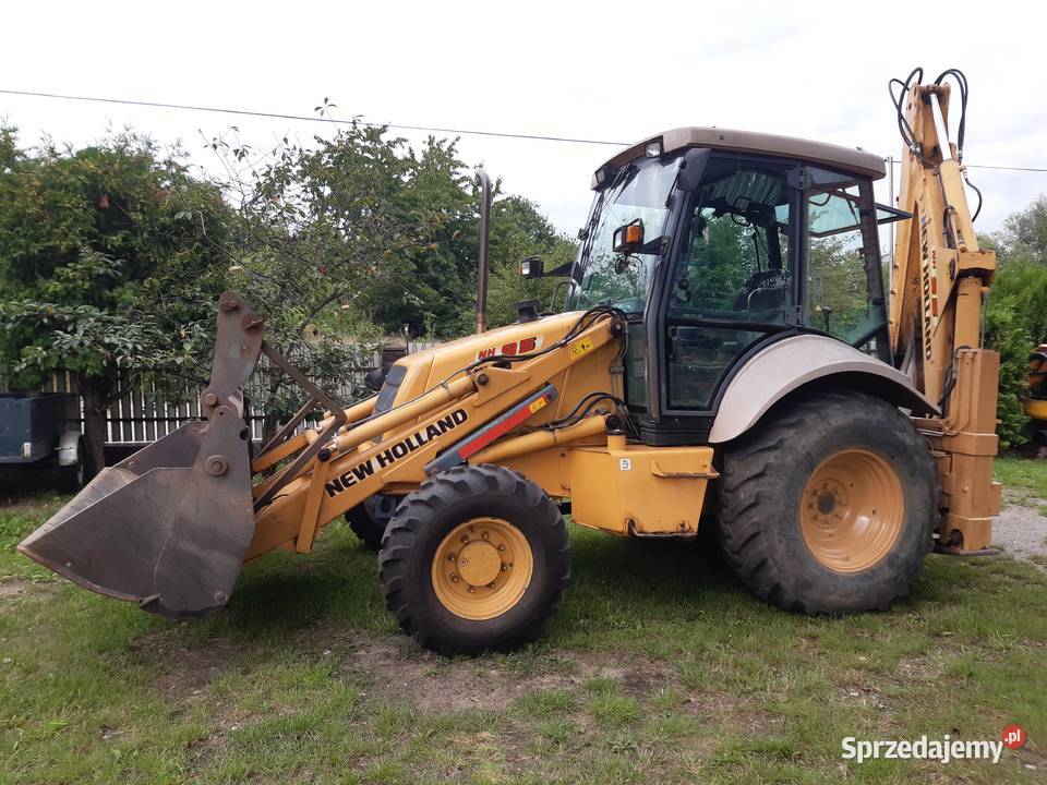 koparko ładowarka HolLand nh95 jcb cat case